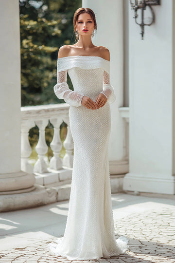 Robe de mariée à manches longues fourreau ivoire à épaule dénudée